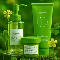 This luxurious Korean Mung Bean Complete Cleansing Set is displayed in a vibrant, nature-inspired scene that highlights its clean-beauty purity and premium botanical origins. The radiant Mung Bean Cleansing Oil stands on the left with a golden-green glow, while the pH-balanced Mung Bean Cleansing Foam rises tall beside it, embodying advanced Korean deep-cleansing innovation. In front, the rich Mung Bean Pore Clay Mask showcases its detoxifying green texture. Modern Korean Skincare, acne fighter.
